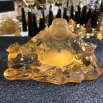 Tượng di lặc để taplo